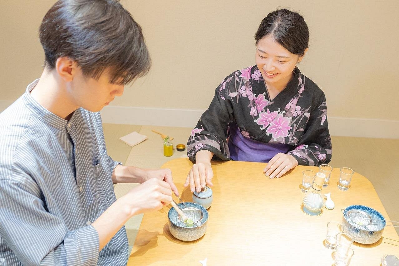 Guests enjoying a matcha tea ceremony experience
